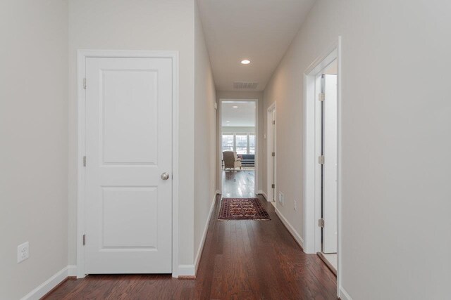 hall featuring dark hardwood / wood-style flooring