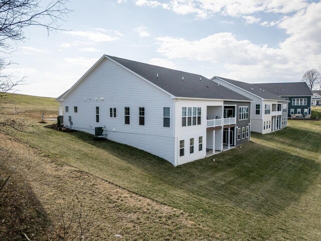 view of front of property featuring central air condition unit and a porch