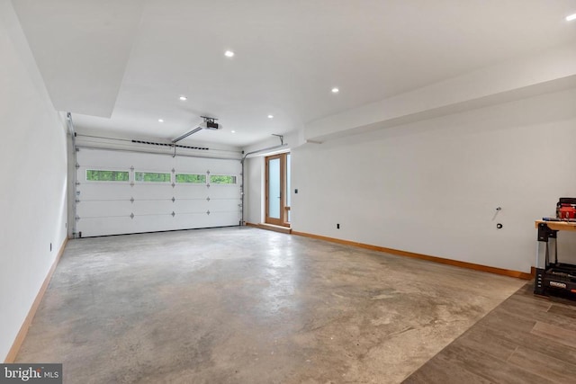 559 Bessie Bell Mountain Rd, Castleton, VA 22716 - garage with baseboards, recessed lighting, and a garage door opener