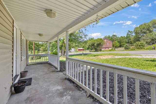 3416 Point Rd E, Elkton, VA 22827 - porch featuring a yard and view of scattered trees