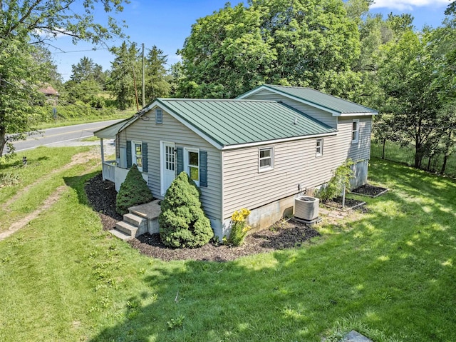 3416 Point Rd E, Elkton, VA 22827 - view of side of home with a metal roof and a lawn