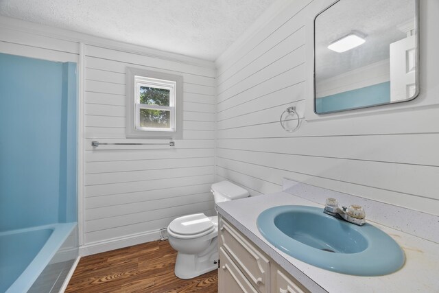 3416 Point Rd E, Elkton, VA 22827 - full bathroom featuring a textured ceiling, wood finished floors, vanity, and wood walls