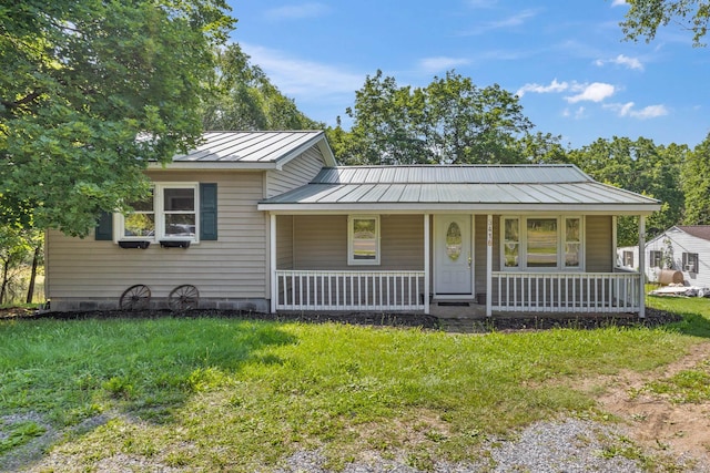 3416 Point Rd E, Elkton, VA 22827 - view of front facade with a standing seam roof, a porch, a metal roof, and a front lawn