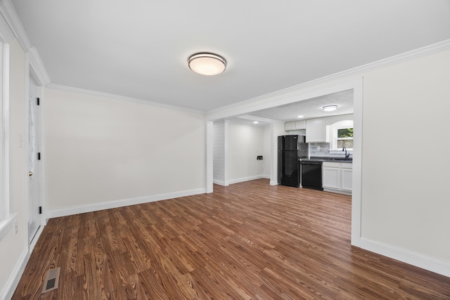3416 Point Rd E, Elkton, VA 22827 - unfurnished living room with dark wood finished floors and crown molding