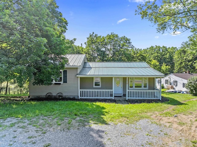 3416 Point Rd E, Elkton, VA 22827 - bungalow-style home featuring a porch, a metal roof, and a standing seam roof