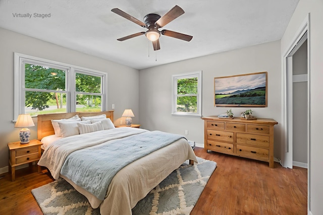 3416 Point Rd E, Elkton, VA 22827 - bedroom featuring wood finished floors and ceiling fan