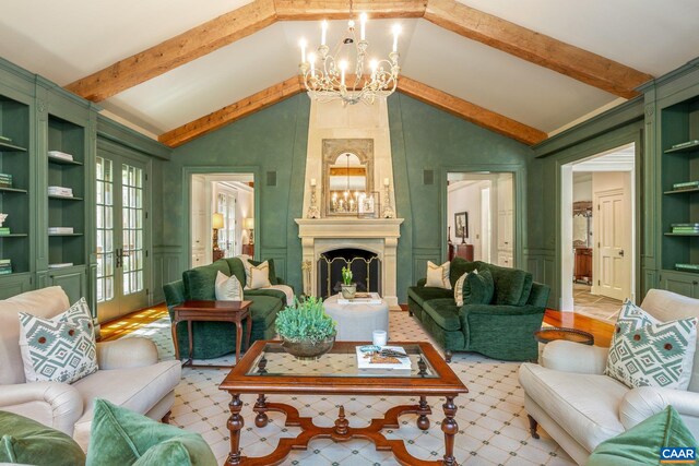 353 Bloomfield Rd, Charlottesville, VA 22901 - living room with a chandelier, a decorative wall, built in features, and a large fireplace