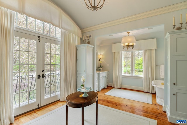 353 Bloomfield Rd, Charlottesville, VA 22901 - entryway with a chandelier, french doors, ornamental molding, light wood finished floors, and baseboards