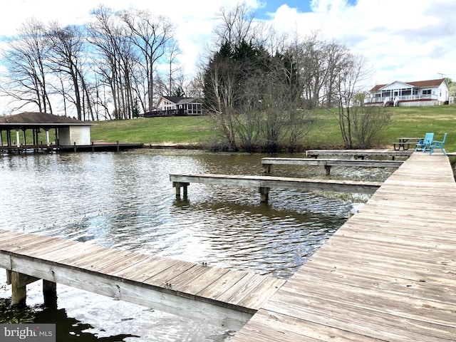 6905 Lakes Edge Way, Mineral, VA 23117 - dock area with a water view and a lawn