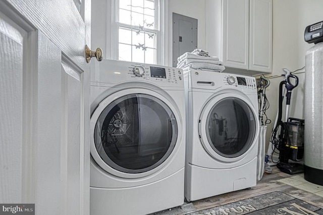 6905 Lakes Edge Way, Mineral, VA 23117 - clothes washing area with separate washer and dryer, electric panel, cabinet space, and wood finished floors