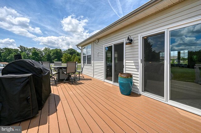 6905 Lakes Edge Way, Mineral, VA 23117 - wooden terrace featuring outdoor dining space