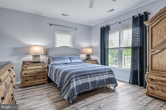 6905 Lakes Edge Way, Mineral, VA 23117 - bedroom with crown molding, light wood-style floors, baseboards, and ceiling fan