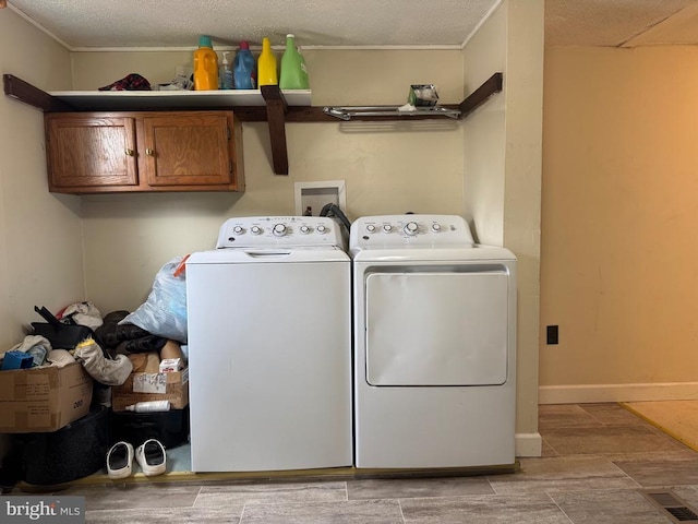 633 Ridge View Ln, Shenandoah, VA 22849 - washroom featuring washing machine and clothes dryer, cabinet space, and ornamental molding