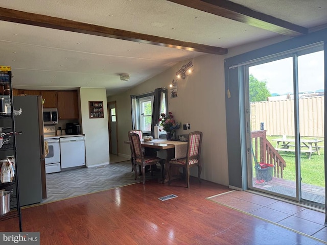 633 Ridge View Ln, Shenandoah, VA 22849 - dining area featuring beam ceiling and light wood finished floors