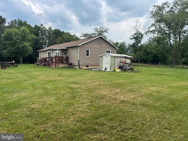 633 Ridge View Ln, Shenandoah, VA 22849 - back of house with a shed, a lawn, a wooden deck, and crawl space