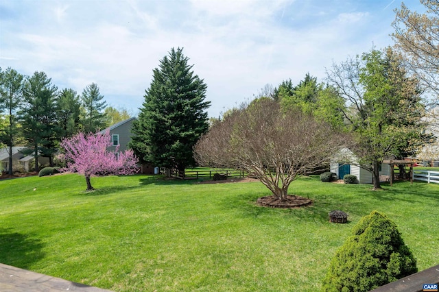 3340 Meadowfield Ln, Charlottesville, VA 22911 - view of yard with an outdoor structure and a storage unit