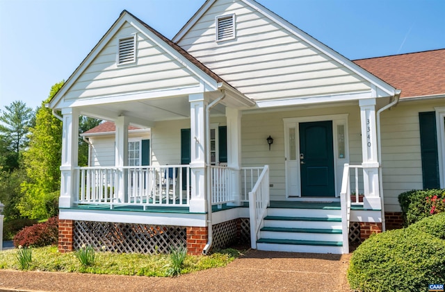 3340 Meadowfield Ln, Charlottesville, VA 22911 - bungalow-style home with a porch and a shingled roof