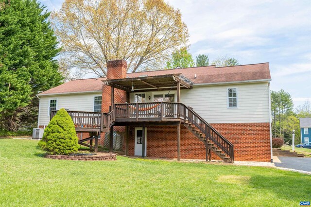 3340 Meadowfield Ln, Charlottesville, VA 22911 - back of house featuring a deck, stairs, a chimney, central AC, and a lawn