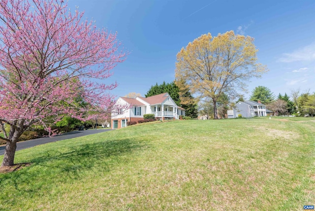 3340 Meadowfield Ln, Charlottesville, VA 22911 - view of grassy yard with driveway and an attached garage