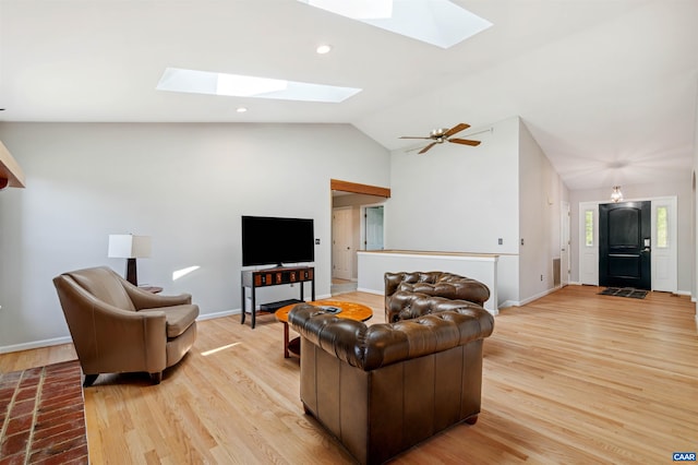 3340 Meadowfield Ln, Charlottesville, VA 22911 - living area with a skylight, light wood finished floors, lofted ceiling, baseboards, and recessed lighting