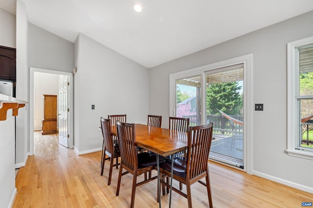 3340 Meadowfield Ln, Charlottesville, VA 22911 - dining room with lofted ceiling, light wood-style flooring, and baseboards