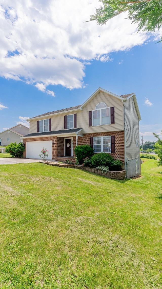 1411 Shenstone Dr, Harrisonburg, VA 22802 - view of front of house with brick siding, driveway, and a front yard