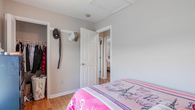 1411 Shenstone Dr, Harrisonburg, VA 22802 - bedroom featuring a closet, light wood finished floors, and attic access