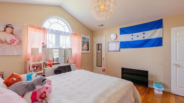 1411 Shenstone Dr, Harrisonburg, VA 22802 - bedroom featuring wood finished floors and vaulted ceiling
