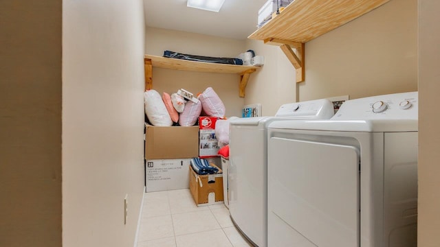1411 Shenstone Dr, Harrisonburg, VA 22802 - washroom with washer and clothes dryer and light tile patterned flooring