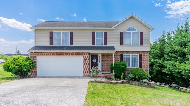 1411 Shenstone Dr, Harrisonburg, VA 22802 - view of front of property featuring a front lawn, an attached garage, brick siding, and concrete driveway