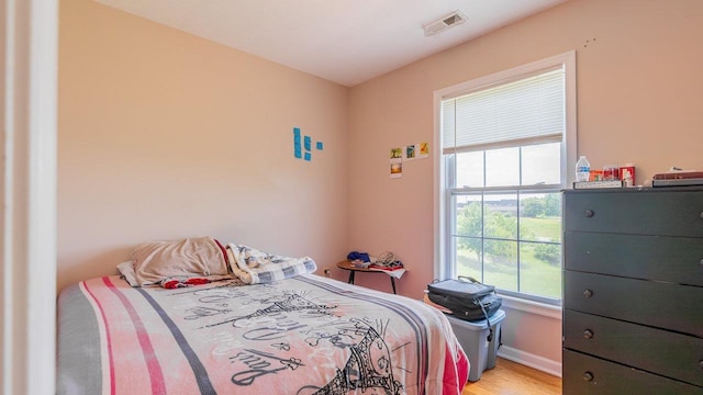 1411 Shenstone Dr, Harrisonburg, VA 22802 - bedroom featuring light wood-type flooring and baseboards