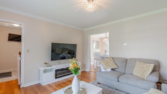 1411 Shenstone Dr, Harrisonburg, VA 22802 - living area with a chandelier, ornamental molding, and wood finished floors
