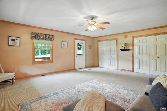 2070 Woodson Rd, Nelson, VA 22967 - living area with light carpet, a ceiling fan, and crown molding