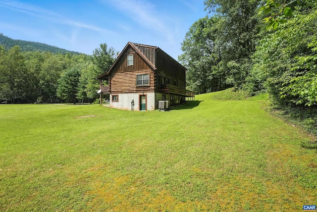 2070 Woodson Rd, Nelson, VA 22967 - view of side of property with a yard, board and batten siding, a forest view, and log exterior