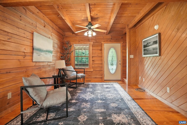2070 Woodson Rd, Nelson, VA 22967 - entryway featuring wood walls, wood finished floors, a ceiling fan, and a wood ceiling with exposed beams