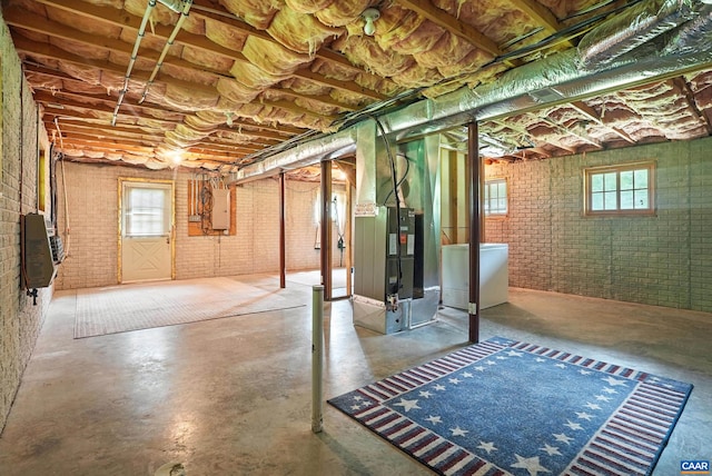 2070 Woodson Rd, Nelson, VA 22967 - below grade area with brick wall, electric panel, heating unit, and plenty of natural light
