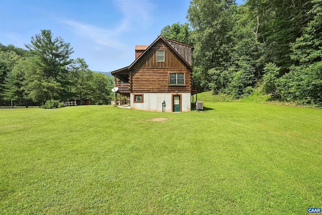 2070 Woodson Rd, Nelson, VA 22967 - rear view of house featuring log siding, a chimney, and a yard