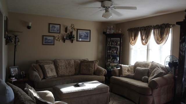 living area with ceiling fan