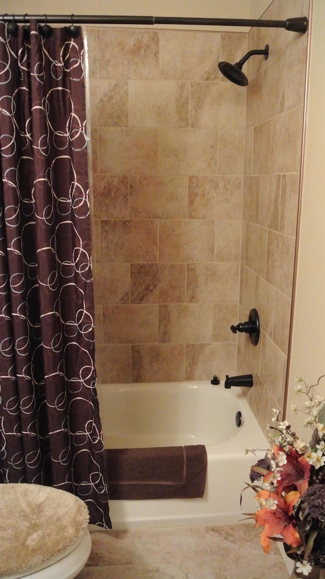 full bath featuring shower / bathtub combination with curtain and tile patterned floors