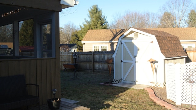 view of shed featuring a fenced backyard