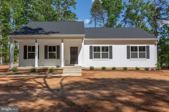 27000 Tatum Rd, Unionville, VA 22567 - view of front facade featuring covered porch, a shingled roof, and board and batten siding