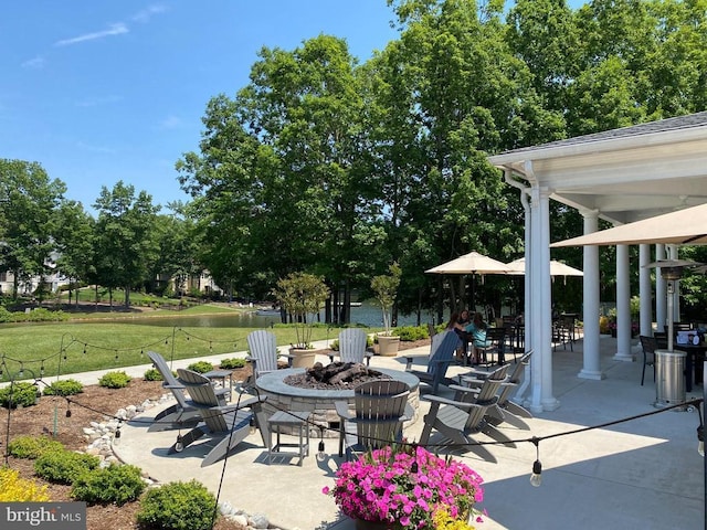 11708 Robin Woods Cir, Spotsylvania, VA 22551 - view of patio / terrace with a fire pit and a water view
