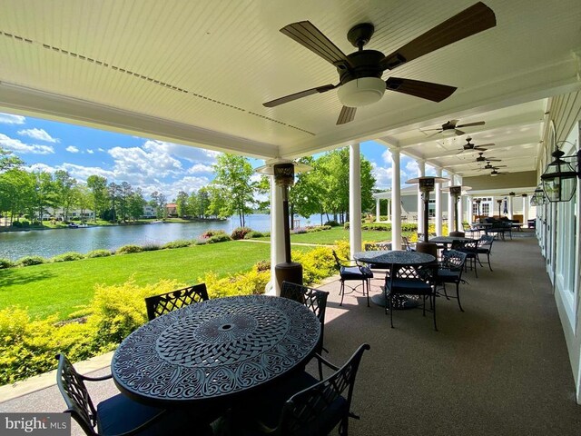 11708 Robin Woods Cir, Spotsylvania, VA 22551 - view of patio with outdoor dining area, a water view, and a ceiling fan