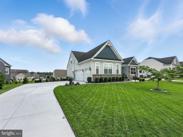 11708 Robin Woods Cir, Spotsylvania, VA 22551 - view of front of home featuring board and batten siding, stone siding, concrete driveway, a front yard, and a residential view