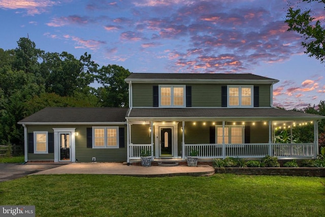 12203 Abner Ct, Fredericksburg, VA 22407 - view of front facade with covered porch and a lawn
