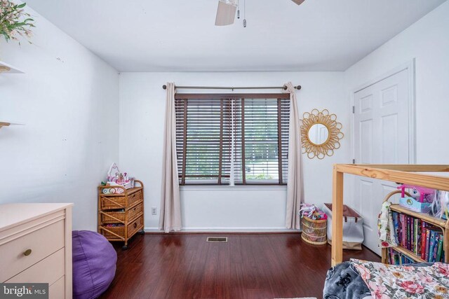 12203 Abner Ct, Fredericksburg, VA 22407 - bedroom with dark wood finished floors, ceiling fan, and baseboards