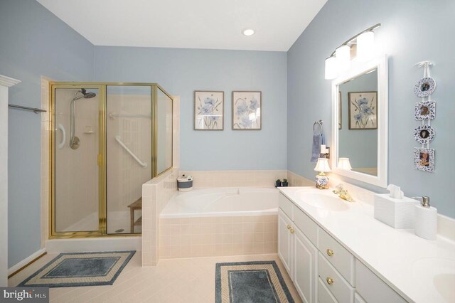 9404 Dalmahoy Ln, Fredericksburg, VA 22408 - full bath with a shower stall, a bath, double vanity, and tile patterned flooring