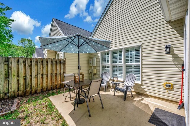 9404 Dalmahoy Ln, Fredericksburg, VA 22408 - view of patio / terrace with fence and outdoor dining space