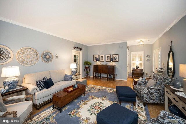 9404 Dalmahoy Ln, Fredericksburg, VA 22408 - living room featuring wood finished floors and ornamental molding