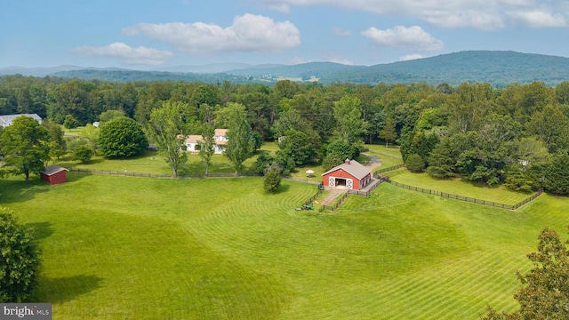  - view of rural area with a mountain backdrop and a pastoral area